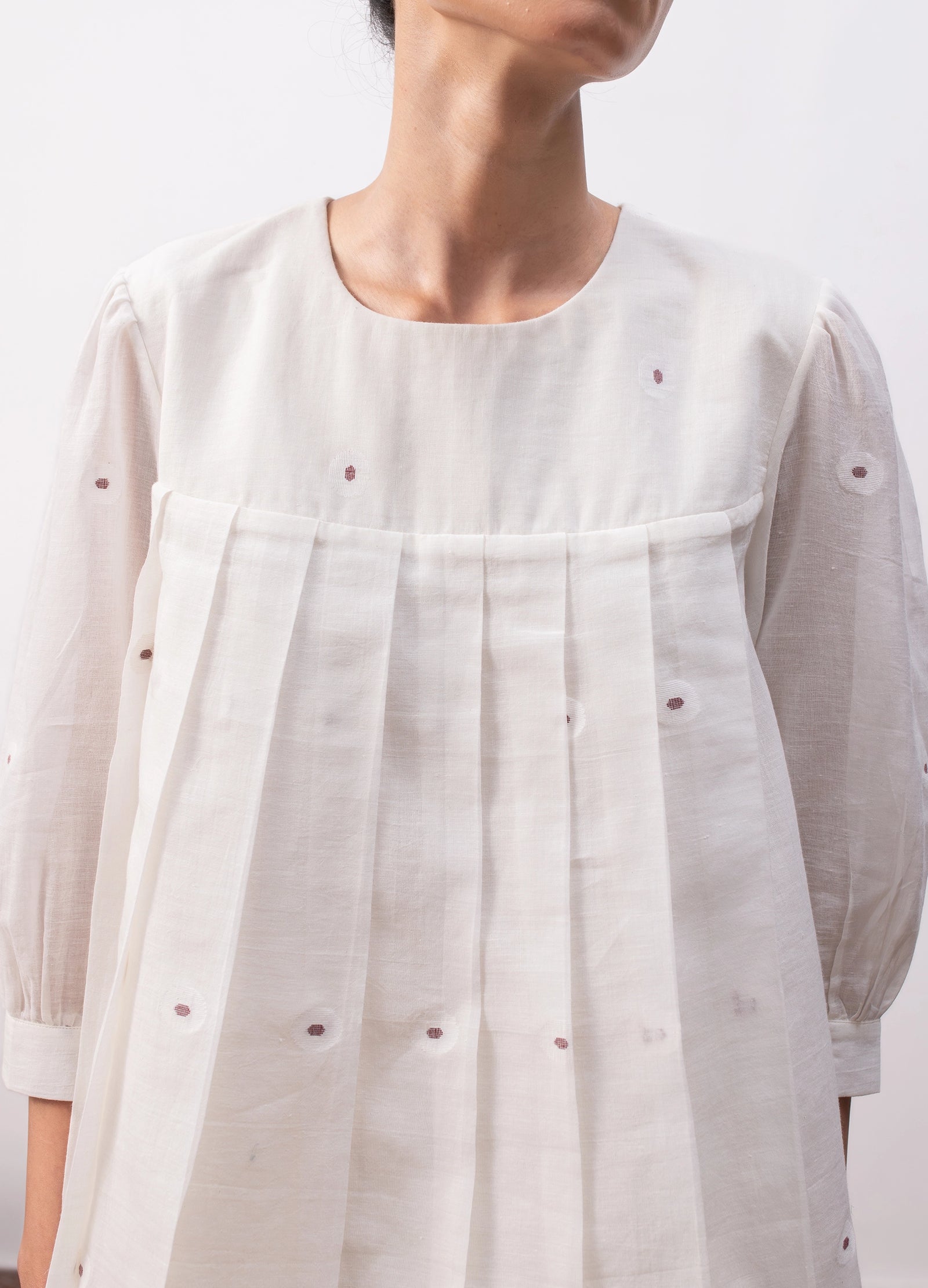 Soft white co-ord with relaxed pleated top and flowy skirt - Hiranya