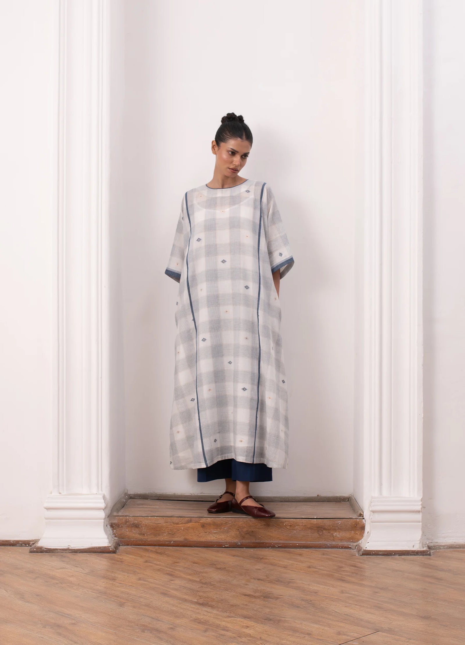 Soft white co-ord set with relaxed kurta top and straight trousers -Hiranya