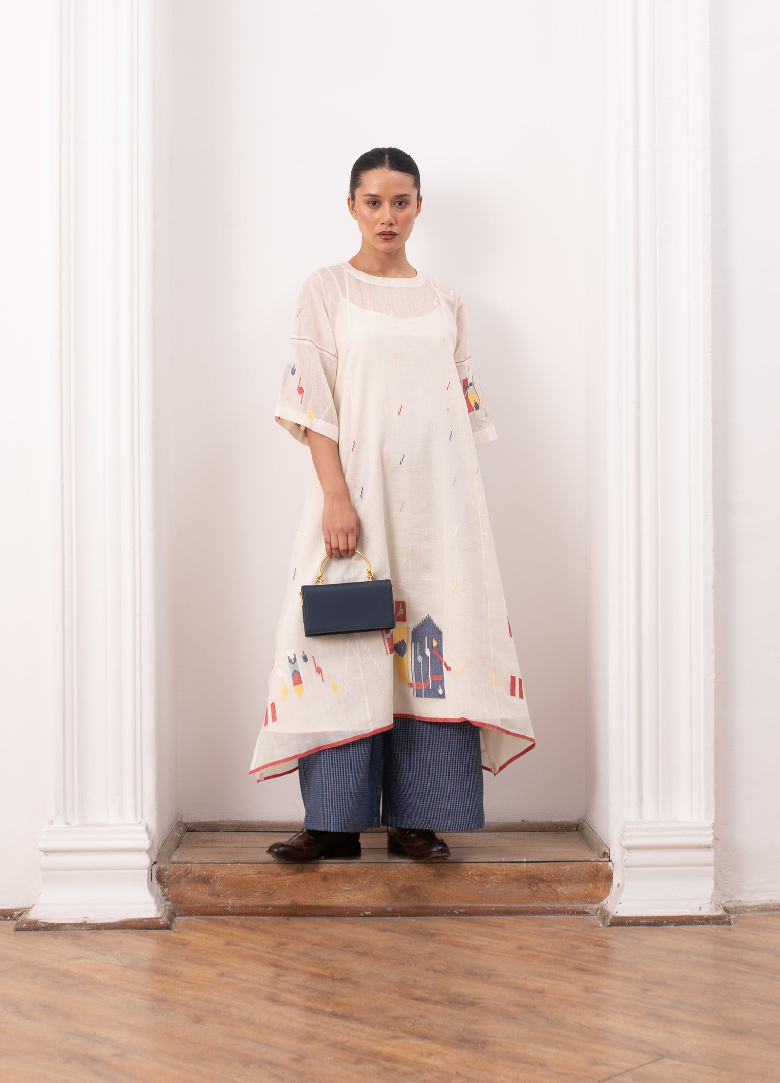 Ivory pleated co-ord set with top and relaxed trousers - Hiranya