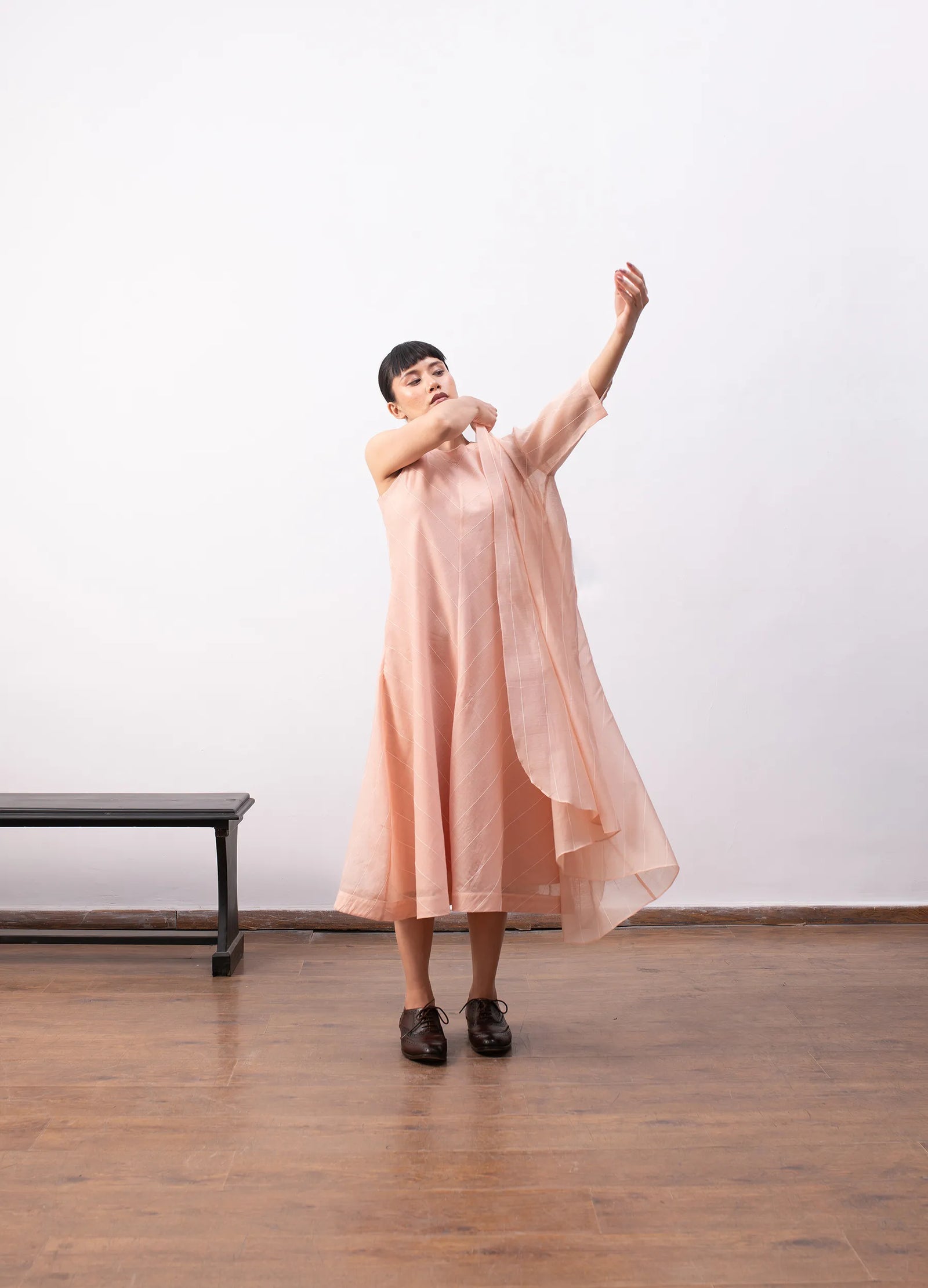 Peach tiered dress for women with relaxed fit – Ingrid dress by Hiranya