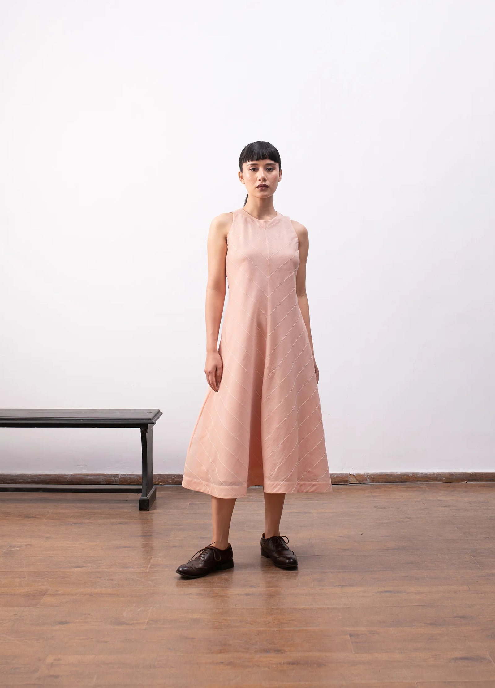 Peach sleeveless dress with soft flowy structure Hiranya