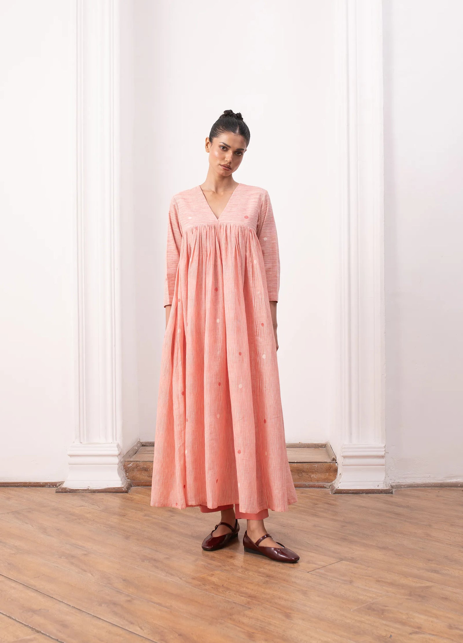 Pink kurta set with relaxed kurta top and wide-leg trousers Hiranya