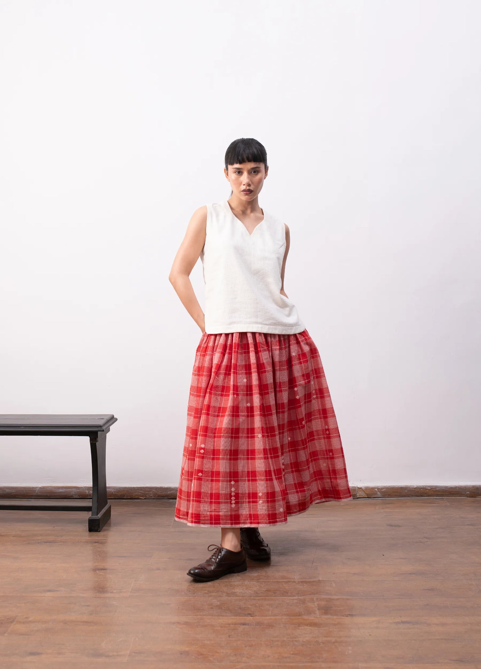 Red skirt set with fitted top and skirt Hiranya