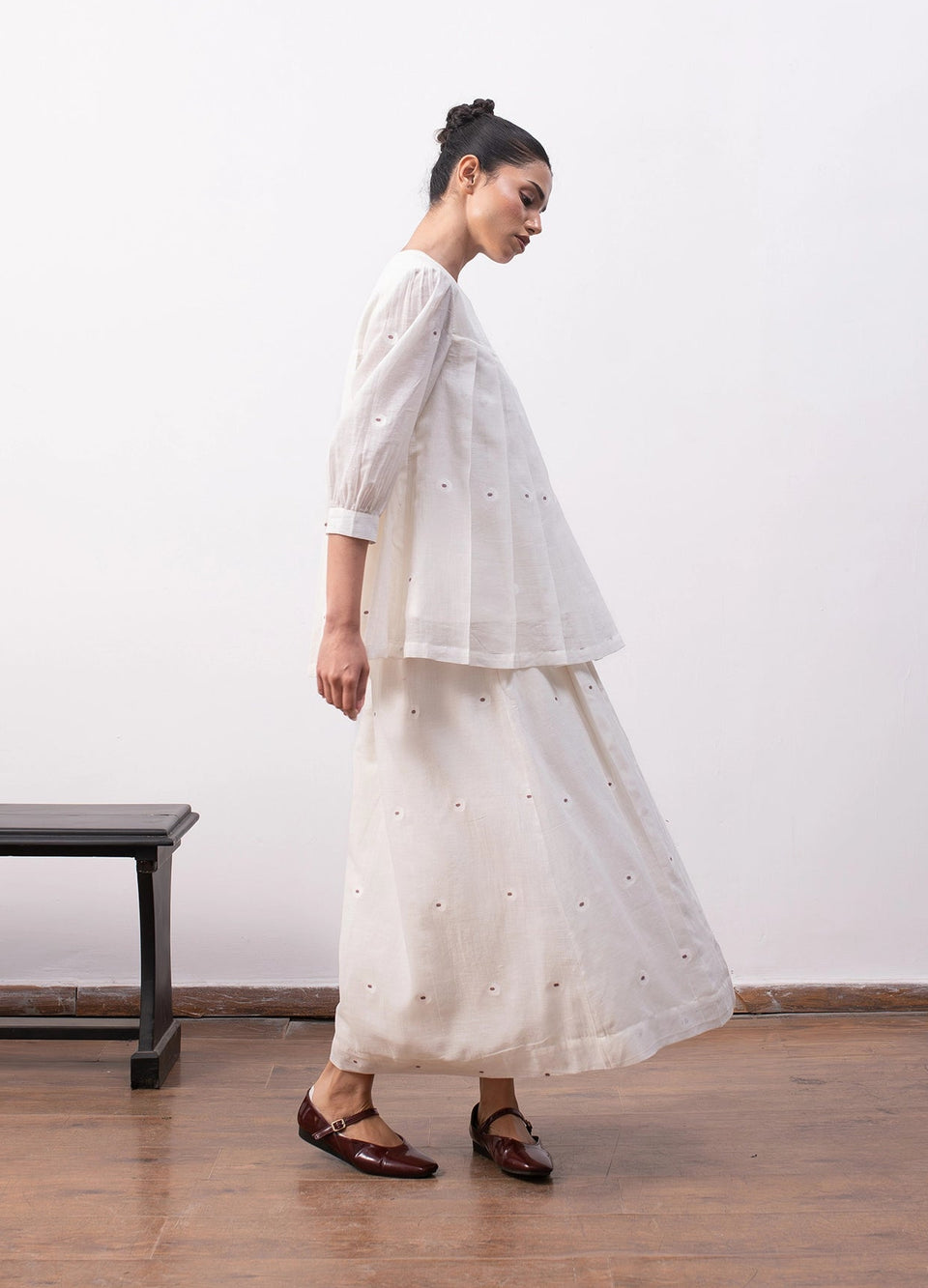 Soft white co-ord with relaxed pleated top and  flowy skirt - Hiranya