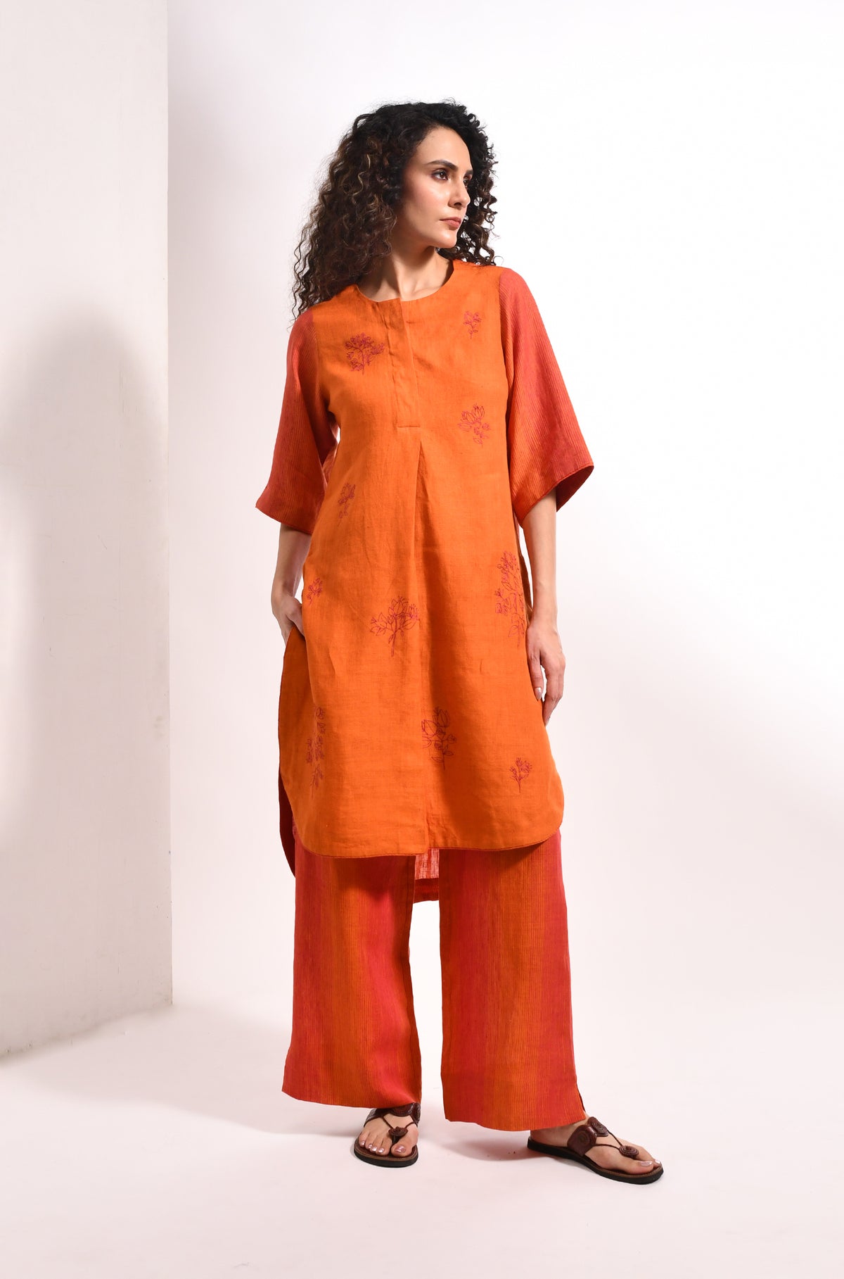 Amber linen co-ord set with bougainvillea embroidery kurta and striped trousers for women - Hiranya