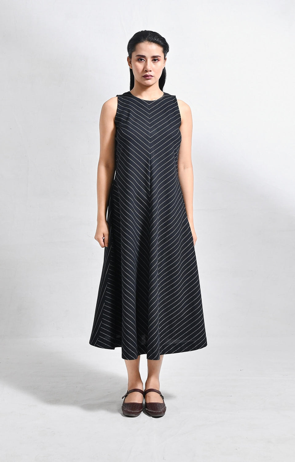 Pinstriped black cotton sleeveless A-line midi dress for women