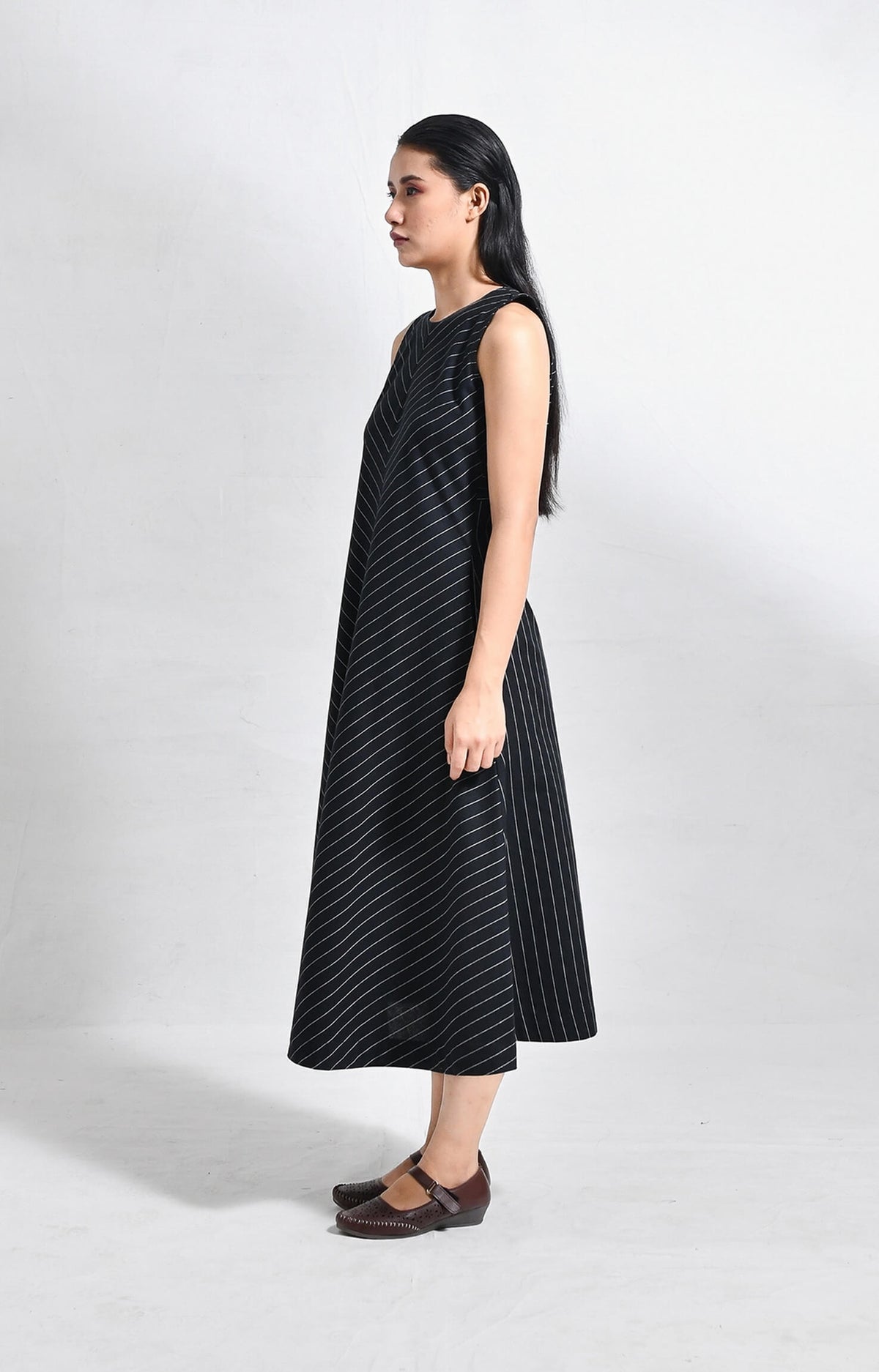 Pinstriped black cotton sleeveless A-line midi dress for women