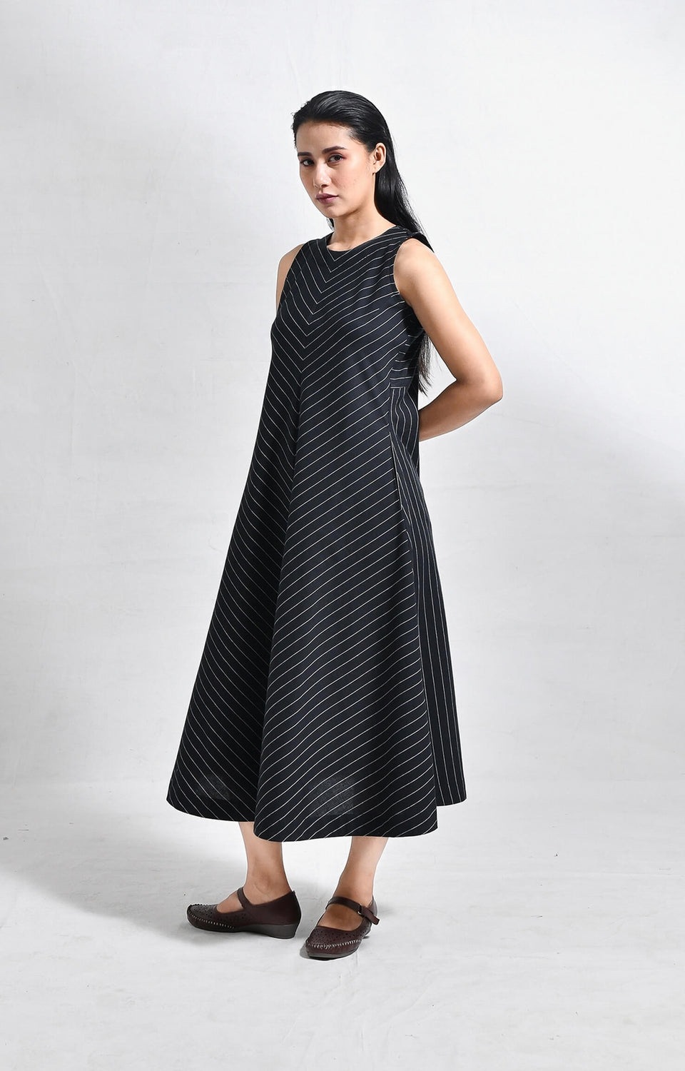 Pinstriped black cotton sleeveless A-line midi dress for women