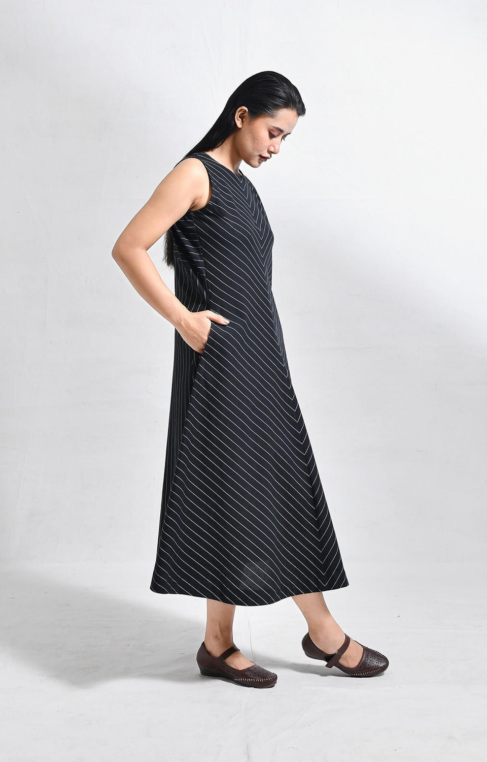 Pinstriped black cotton sleeveless A-line midi dress for women