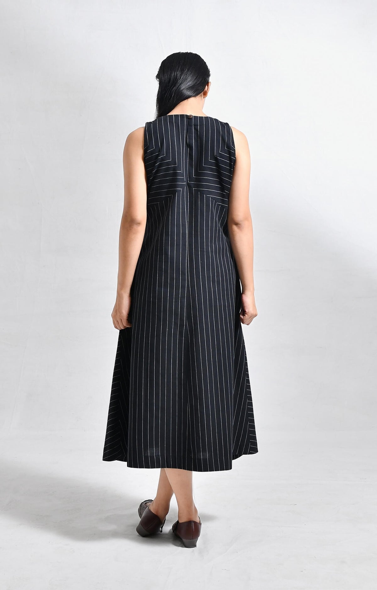 Pinstriped black cotton sleeveless A-line midi dress for women
