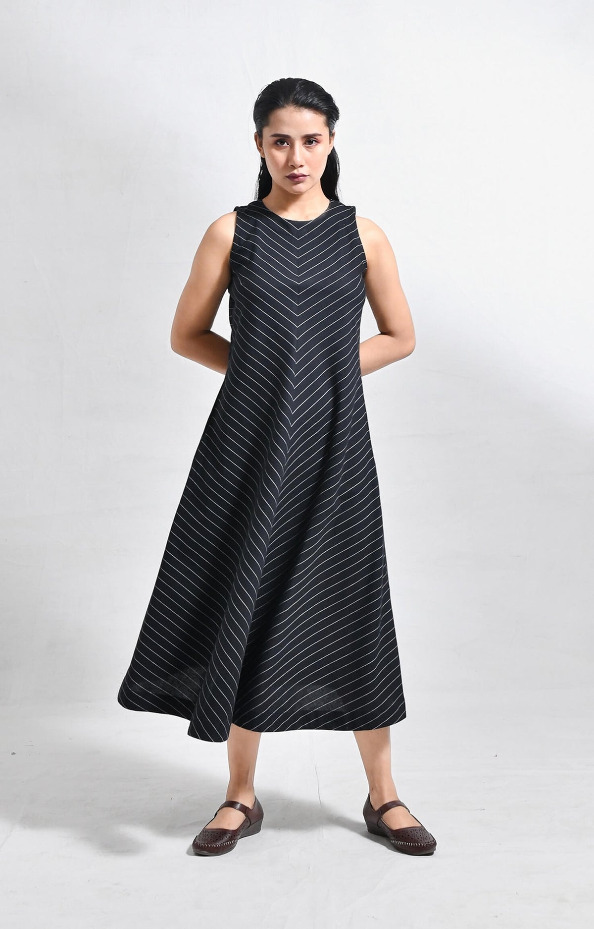 Pinstriped black cotton sleeveless A-line midi dress for women