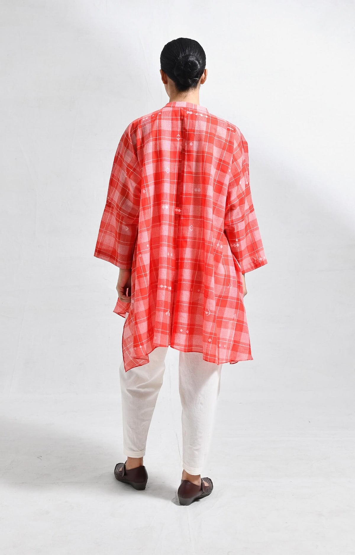 kurta set with traditional handwoven detailing