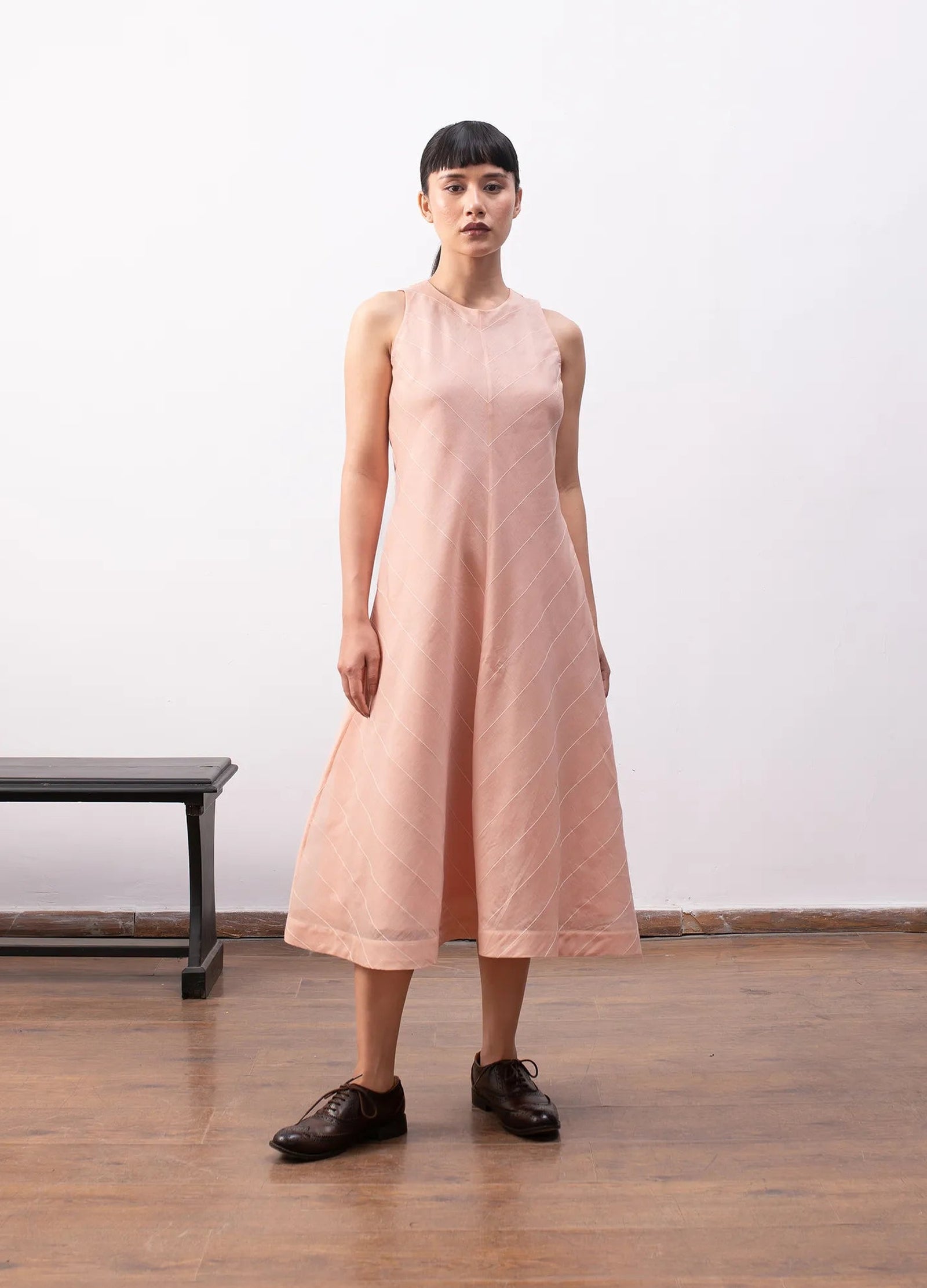 Peach sleeveless dress with soft flowy structure Hiranya