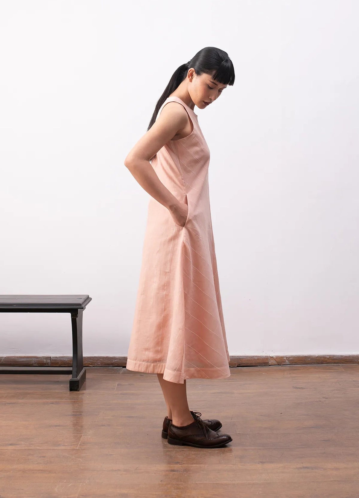 Peach sleeveless dress with soft flowy structure Hiranya