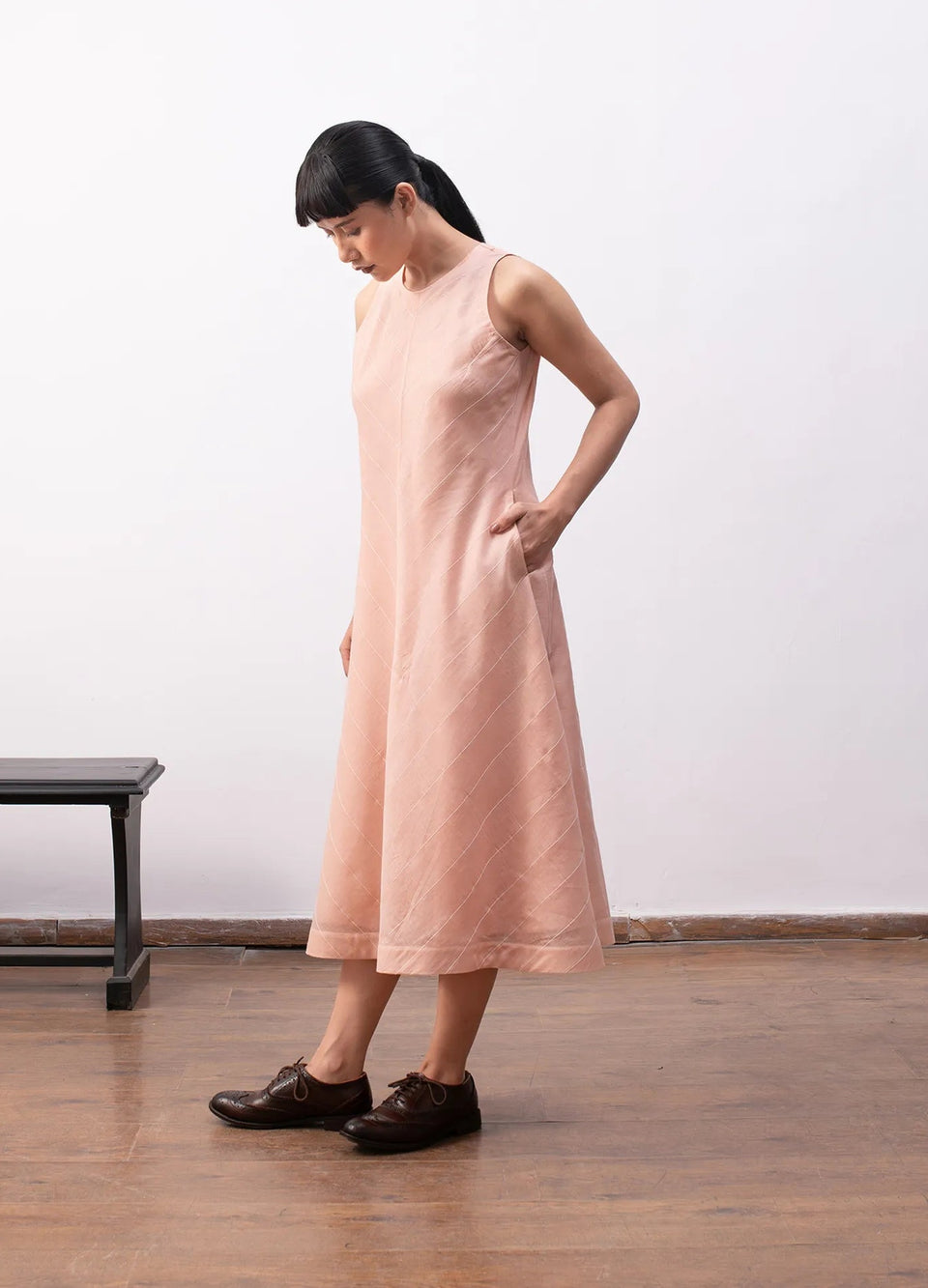 Peach sleeveless dress with soft flowy structure Hiranya