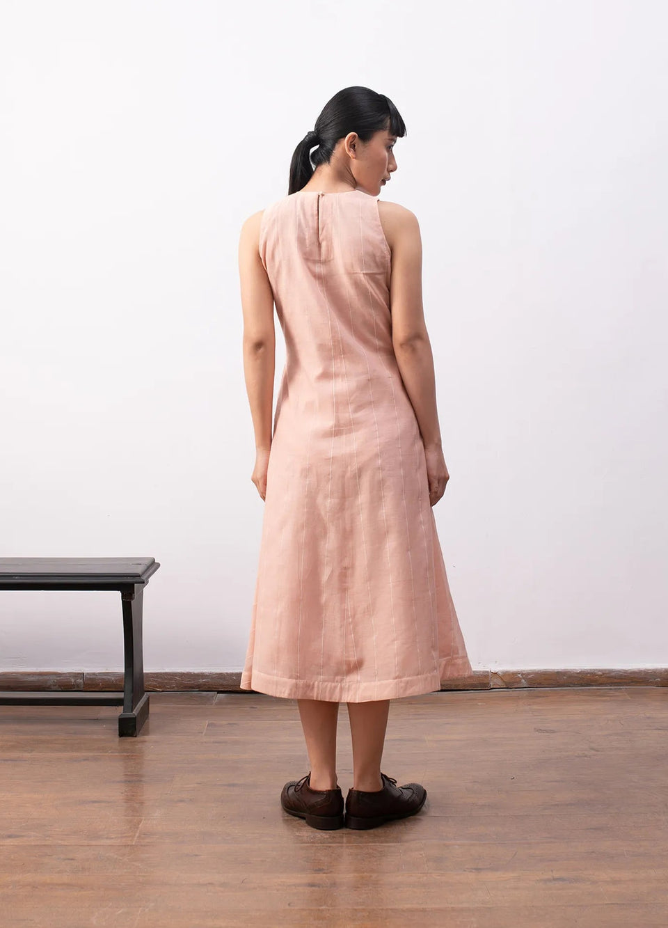 Peach sleeveless dress with soft flowy structure Hiranya