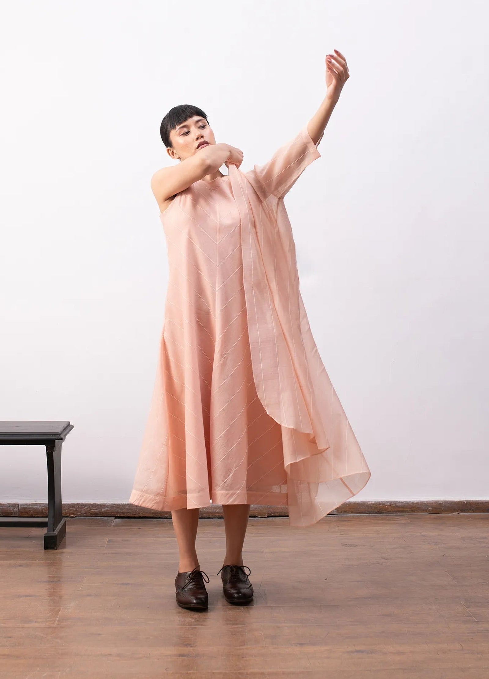 Peach tiered dress for women with relaxed fit – Ingrid dress by Hiranya