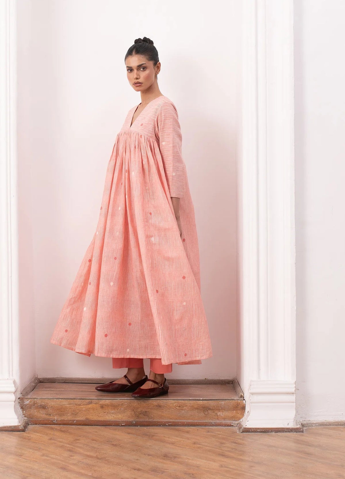 Pink kurta set with relaxed kurta top and wide-leg trousers Hiranya