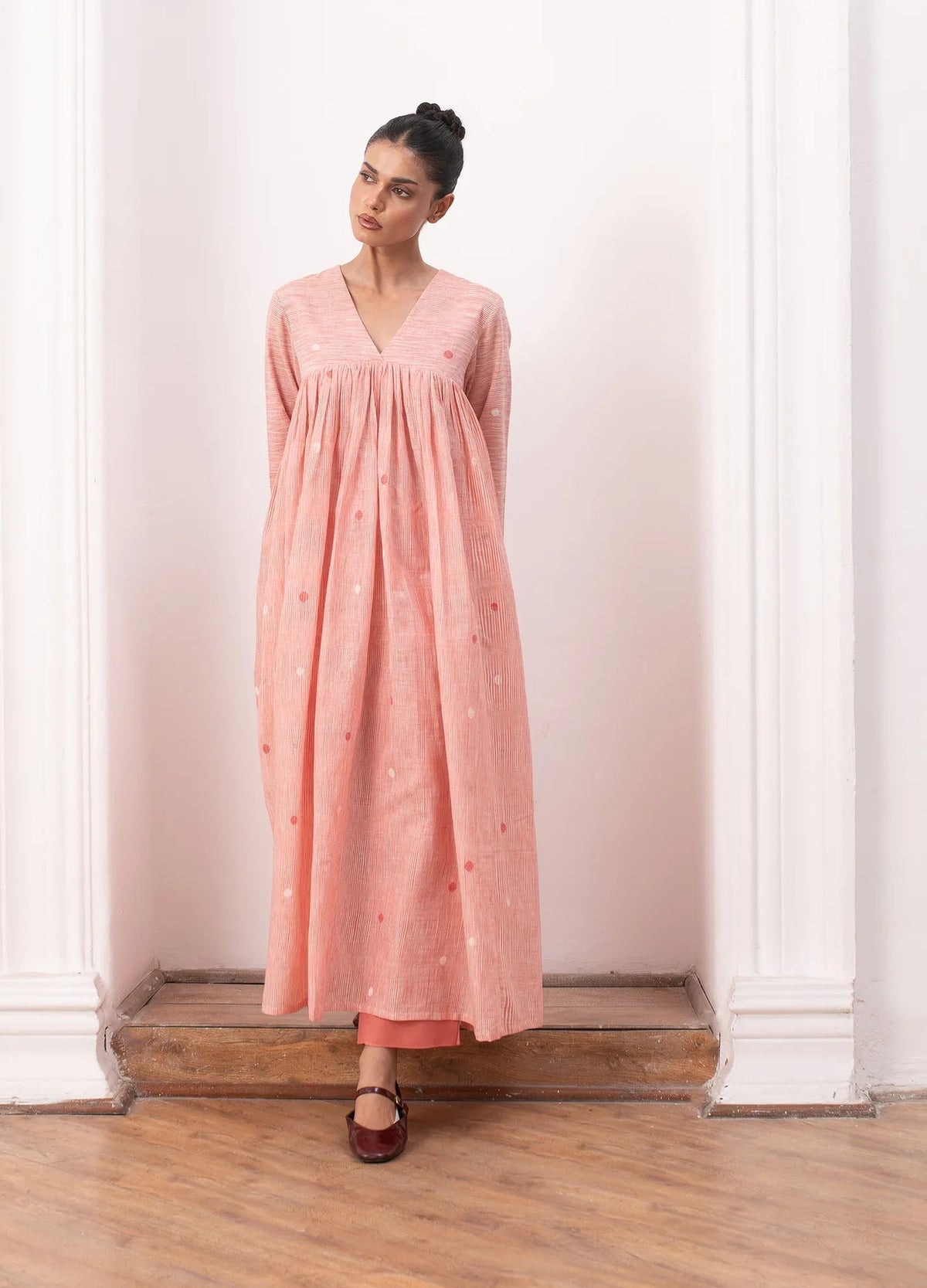 Pink kurta set with relaxed kurta top and wide-leg trousers Hiranya