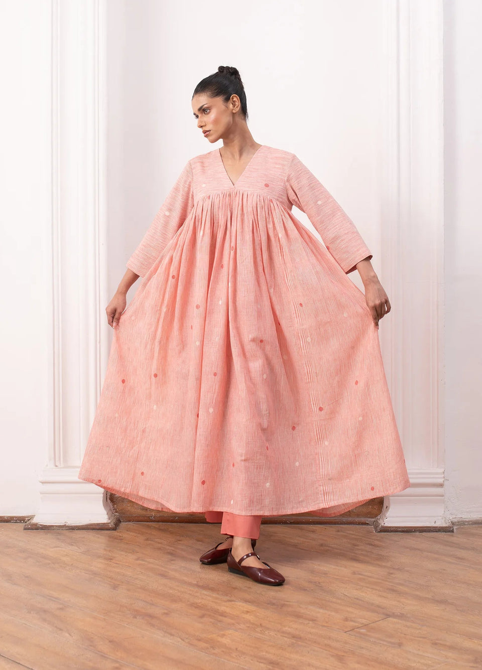 Pink kurta set with relaxed kurta top and wide-leg trousers Hiranya
