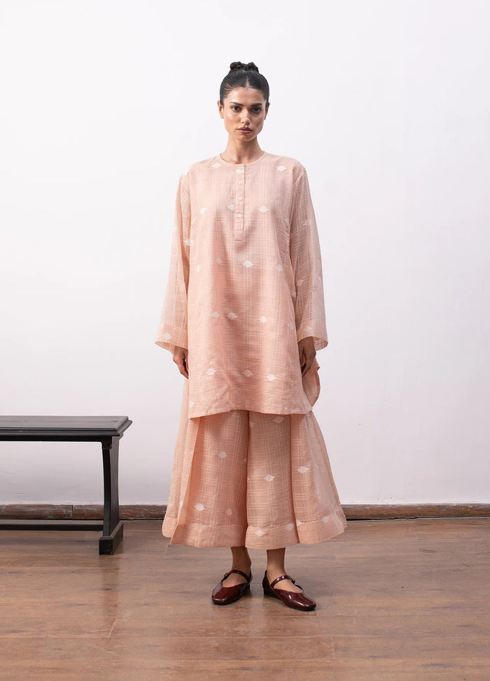 Peach co-ord set with relaxed kurta and wide-leg trousers - Hiranya