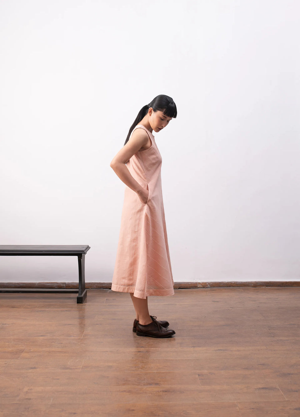 Peach sleeveless dress with soft flowy structure Hiranya