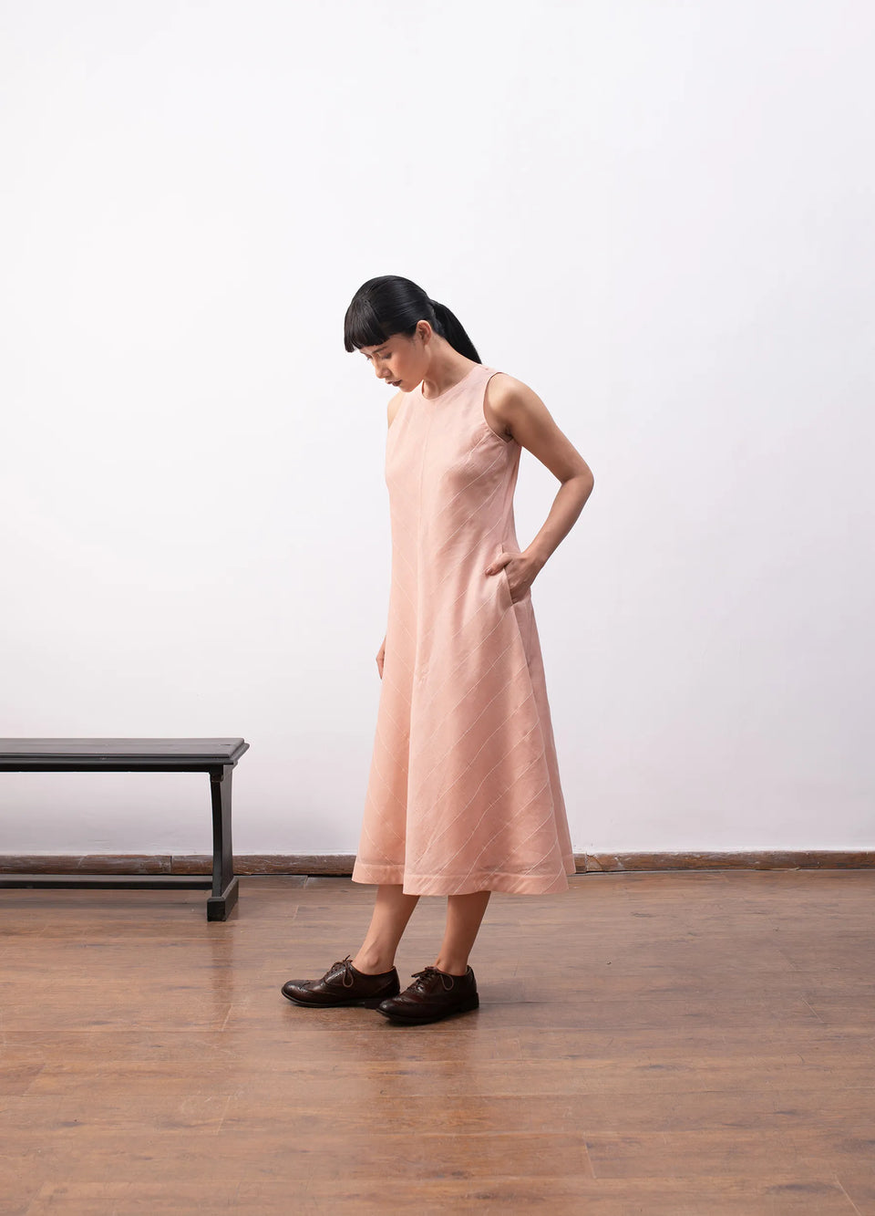 Peach sleeveless dress with soft flowy structure Hiranya