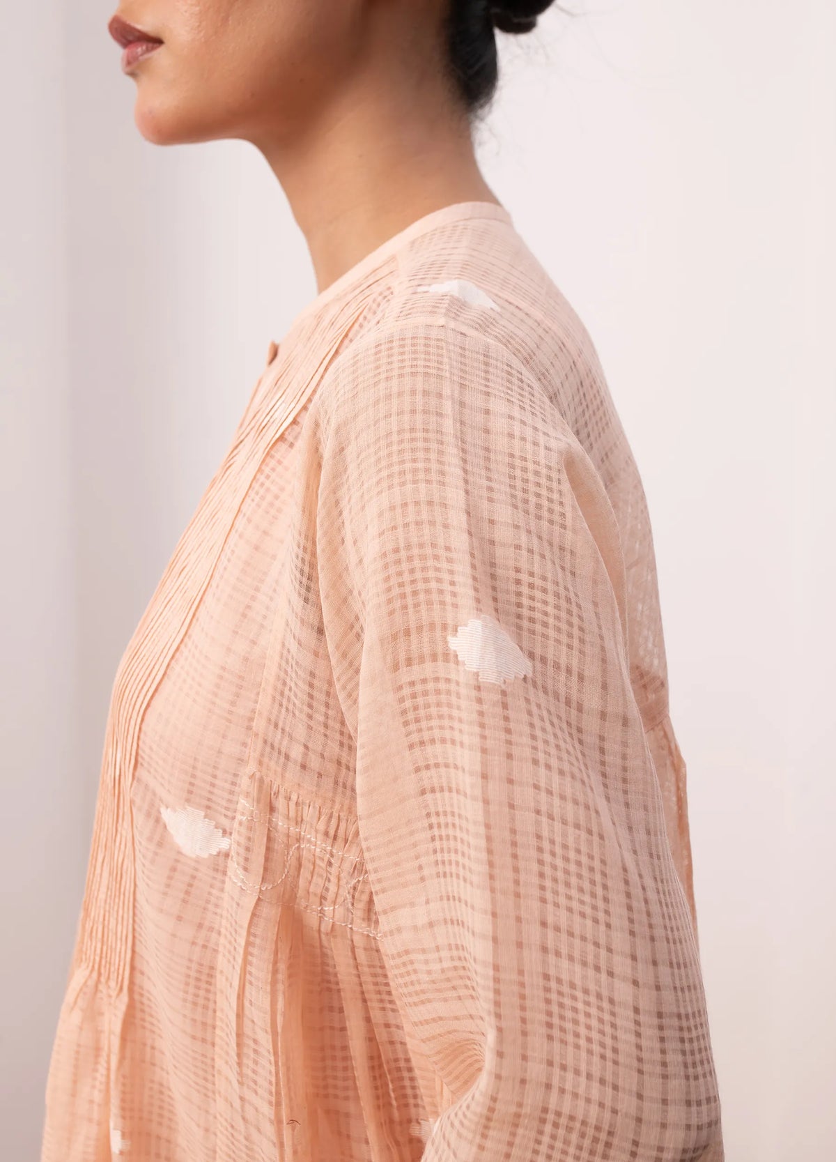 Peach midi dress with soft structure and flow - Hiranya