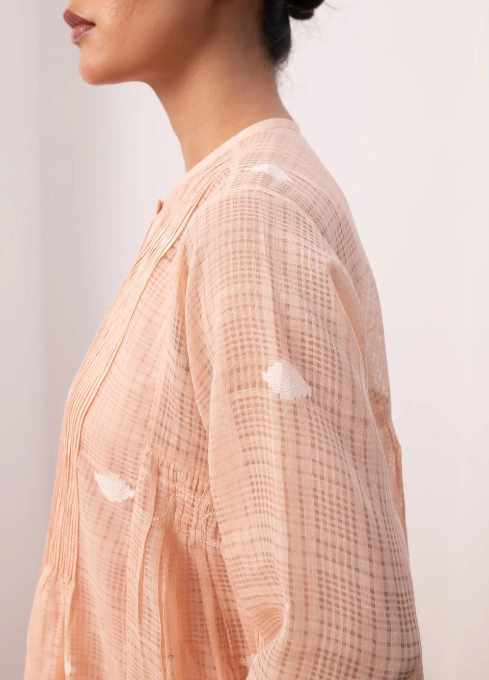 Peach midi dress with soft structure and flow - Hiranya