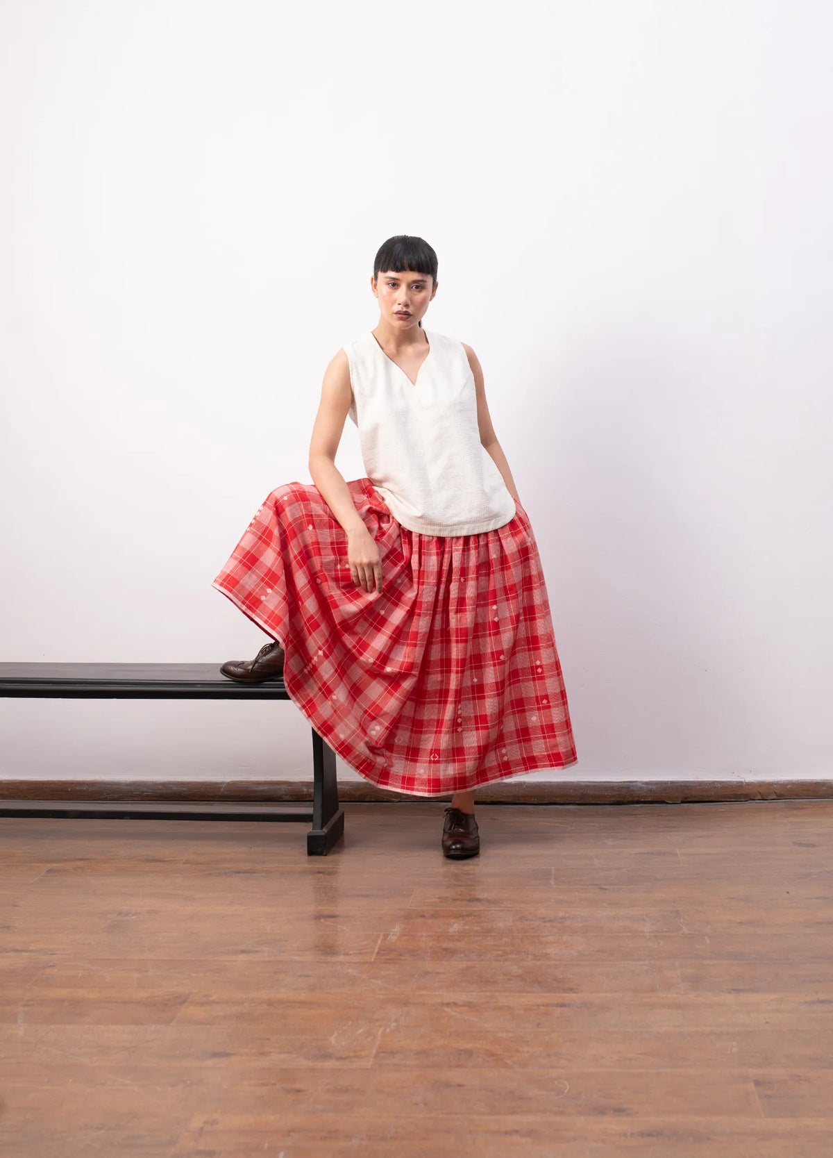 Red skirt set with fitted top and skirt Hiranya