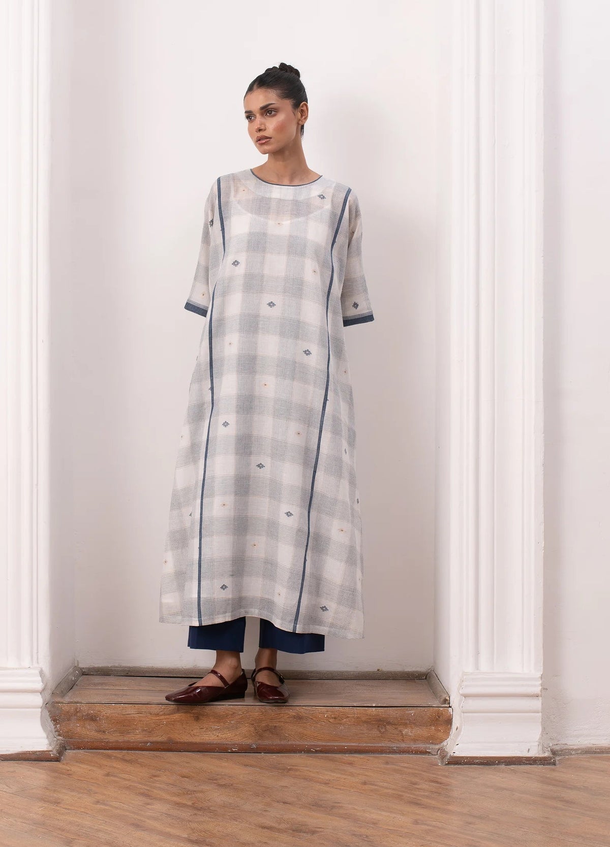 Soft white co-ord set with relaxed kurta top and straight trousers -Hiranya