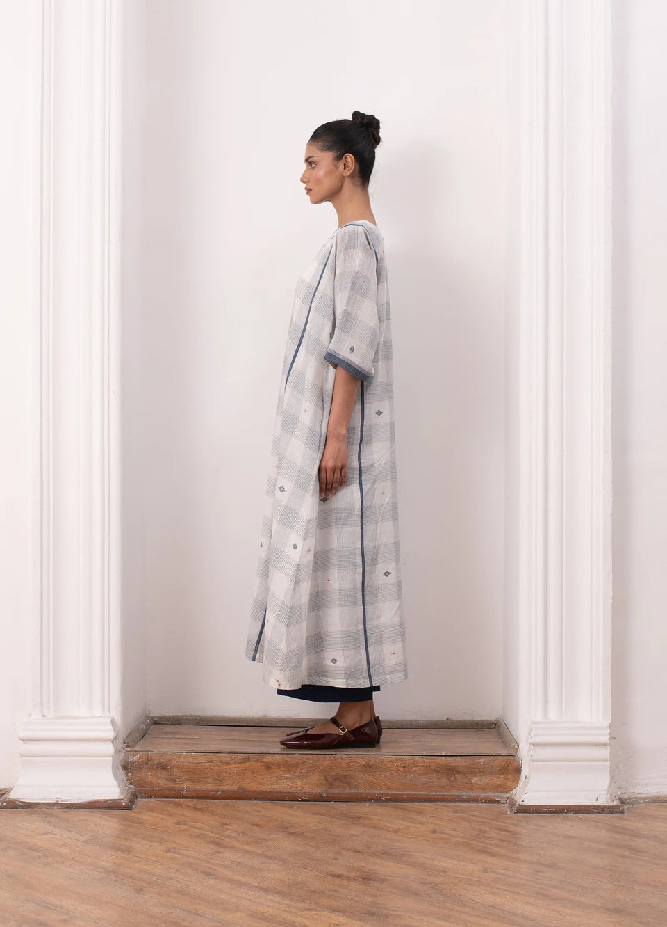 Soft white co-ord set with relaxed kurta top and straight trousers -Hiranya