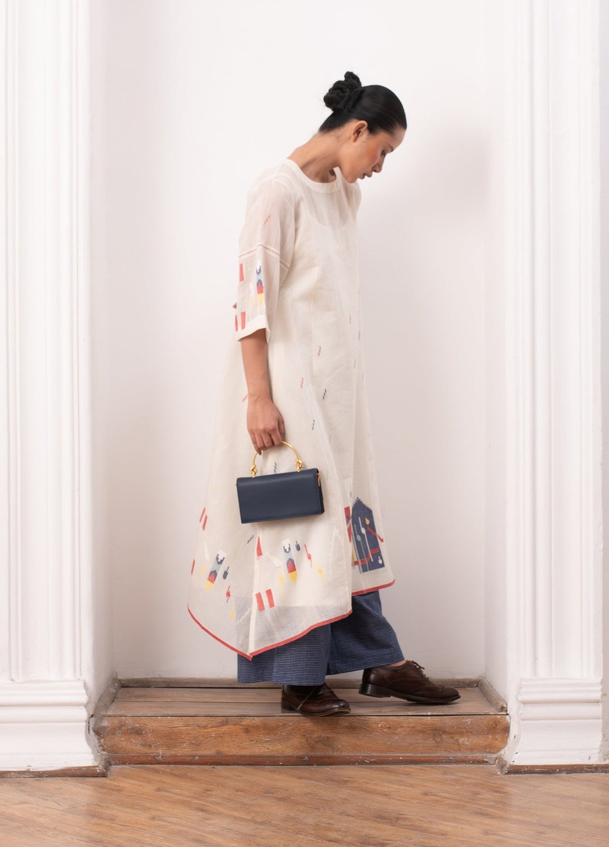 Ivory pleated co-ord set with top and relaxed trousers - Hiranya