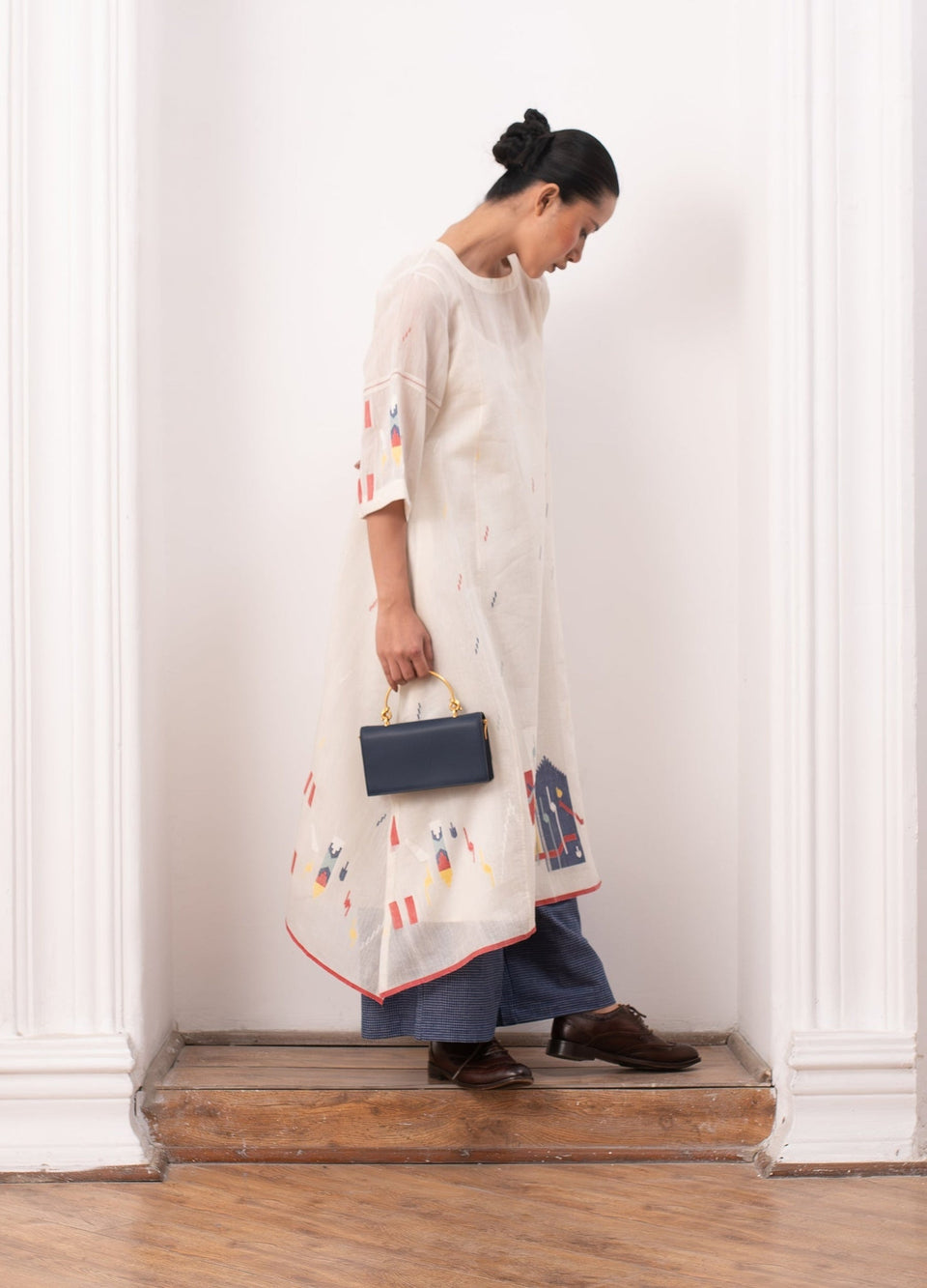 Ivory pleated co-ord set with top and relaxed trousers - Hiranya