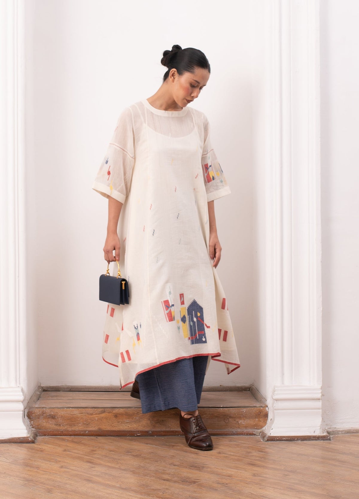 Ivory pleated co-ord set with top and relaxed trousers - Hiranya