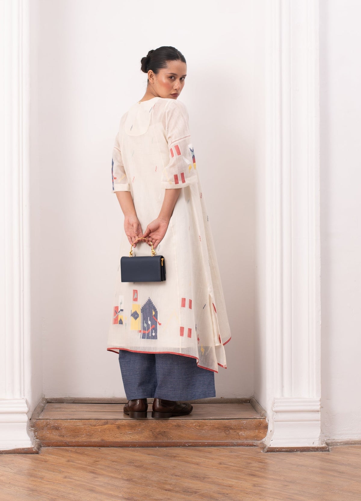 Ivory pleated co-ord set with top and relaxed trousers - Hiranya