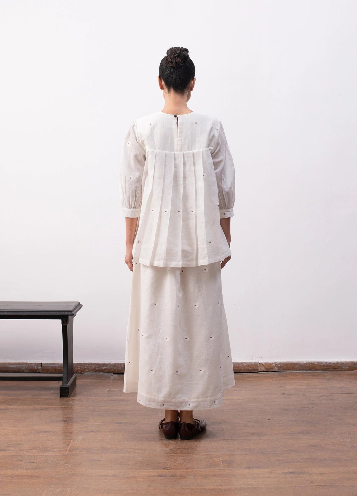 Soft white co-ord with relaxed pleated top and  flowy skirt - Hiranya