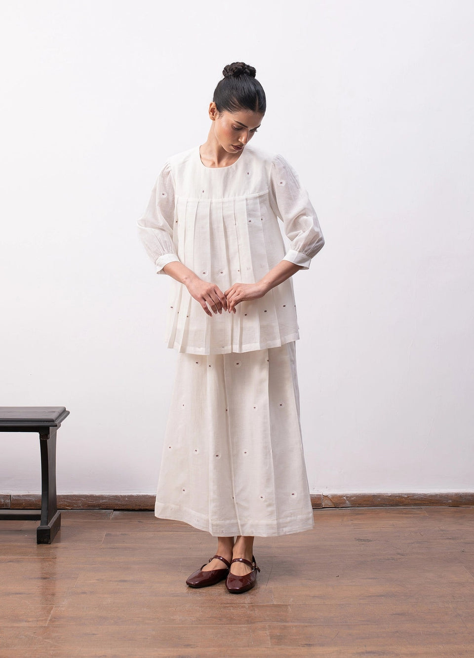 Soft white co-ord with relaxed pleated top and  flowy skirt - Hiranya