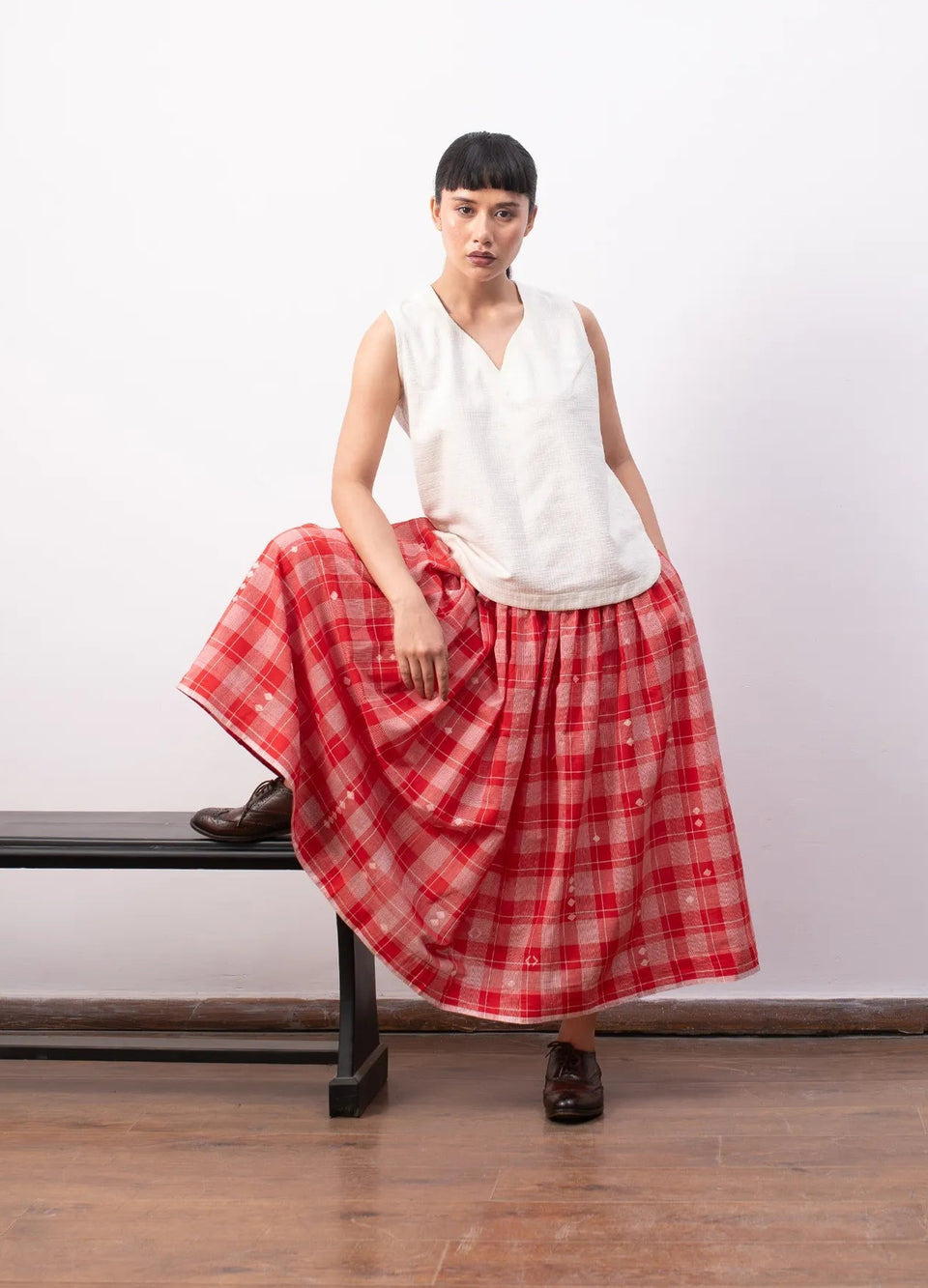 Red skirt set with fitted top and skirt Hiranya